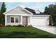 Charming single-story home with gray siding, manicured lawn, and inviting covered entryway at 8720 High Banks Way, Longs, SC 29568