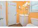 Bathroom with large mirror, towel hooks and a window at 939 Tiffany Ln., North Myrtle Beach, SC 29582