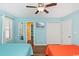 Well-lit bedroom with two beds, closet and wood flooring at 939 Tiffany Ln., North Myrtle Beach, SC 29582