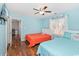 Bright bedroom featuring two twin beds, hardwood floors, and coastal-themed decor at 939 Tiffany Ln., North Myrtle Beach, SC 29582