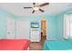 Bedroom with two beds, TV, and a ceiling fan at 939 Tiffany Ln., North Myrtle Beach, SC 29582