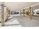 Spacious covered parking area with support beams, offering ample space for vehicles and storage at 939 Tiffany Ln., North Myrtle Beach, SC 29582