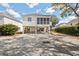 Stilted beach house with spacious under-house parking and a screened porch perfect for enjoying coastal breezes at 939 Tiffany Ln., North Myrtle Beach, SC 29582