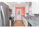 Galley kitchen with stainless steel appliances and granite countertops at 939 Tiffany Ln., North Myrtle Beach, SC 29582
