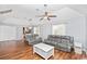 Open living room features vaulted ceilings, ceiling fan, and wood-look flooring at 939 Tiffany Ln., North Myrtle Beach, SC 29582