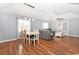 Open concept living room and dining area with wood floors at 939 Tiffany Ln., North Myrtle Beach, SC 29582