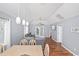 Bright living room with hardwood floors, comfortable seating, and access to outdoor patio at 939 Tiffany Ln., North Myrtle Beach, SC 29582