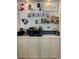 Charming coffee bar with anchor-themed mugs and stylish decor adds a touch of coastal charm to your home at 971 Blue Stem Dr. # 41 H, Pawleys Island, SC 29585