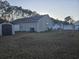 The backyard includes an outdoor storage shed and a well-maintained privacy fence at 9903 Conifer Ln., Murrells Inlet, SC 29576