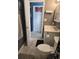 Bathroom featuring a toilet, sink with cabinet, mirror, and basketball hoop over the doorway at 9903 Conifer Ln., Murrells Inlet, SC 29576