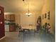 Charming dining room with a classic table setting and elegant lighting at 9903 Conifer Ln., Murrells Inlet, SC 29576