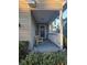 Inviting front porch with railing and decor, offering a cozy welcome to this charming home at 9903 Conifer Ln., Murrells Inlet, SC 29576