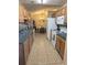 Well-equipped kitchen with an open view to the dining area at 9903 Conifer Ln., Murrells Inlet, SC 29576