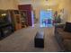 Open-concept living room featuring comfortable seating and seamless access to dining area at 9903 Conifer Ln., Murrells Inlet, SC 29576