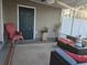 Comfortable patio area featuring stylish seating and serene outdoor space at 9903 Conifer Ln., Murrells Inlet, SC 29576