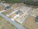 Aerial view of a well-maintained property showcasing its location within a residential area at 10015 W Highway 19, Loris, SC 29569