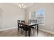 Traditional dining room featuring a window and a chandelier at 10015 W Highway 19, Loris, SC 29569