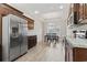Spacious kitchen with wood cabinets, stainless steel appliances, and granite countertops at 10015 W Highway 19, Loris, SC 29569
