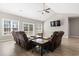 Bright living room featuring high ceilings, wood flooring, and natural light at 10015 W Highway 19, Loris, SC 29569