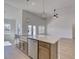 Kitchen island with a white countertop, stainless steel appliances, and pendant lighting at 1071 Laconic Dr., Myrtle Beach, SC 29588