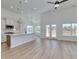Open living space with stainless appliances, white cabinets, and tile backsplash at 1071 Laconic Dr., Myrtle Beach, SC 29588