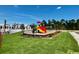 Bright and colorful playground with slides and climbing structures in a well-maintained community area at 1083 Milford Way, Myrtle Beach, SC 29588