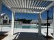 Tranquil community pool with pergolas, offering a serene spot to swim and relax in style at 1083 Milford Way, Myrtle Beach, SC 29588