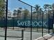 Community tennis courts branded with 