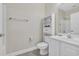 Bright bathroom featuring a white vanity, neutral paint, and tiled floor at 1100 Commons Blvd. # 1001, Myrtle Beach, SC 29572