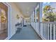 Enjoy the outdoors on this covered porch with sliding glass doors and serene views at 1100 Commons Blvd. # 1001, Myrtle Beach, SC 29572