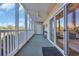 Relax on this covered patio with a ceiling fan and view the surrounding landscape at 1100 Commons Blvd. # 1001, Myrtle Beach, SC 29572