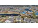 Exceptional aerial view of the charming community with a tranquil pond, manicured lawns, and nearby tennis courts at 1100 Possum Trot Rd. # C202, North Myrtle Beach, SC 29582