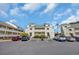 Inviting two-story condo featuring private balconies and convenient parking spaces at 1100 Possum Trot Rd. # C202, North Myrtle Beach, SC 29582