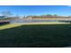 Spacious backyard with a tranquil lake view, ideal for outdoor activities and relaxation at 1105 Oxeye St., North Myrtle Beach, SC 29582