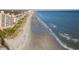 Breathtaking aerial shot of a serene beach and the vast ocean at 1105 Oxeye St., North Myrtle Beach, SC 29582