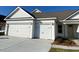 Charming home featuring a two-car garage and welcoming curb appeal on a sunny day at 1105 Oxeye St., North Myrtle Beach, SC 29582