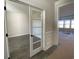 Elegant hallway with a glass door leading into another room with natural light at 1105 Oxeye St., North Myrtle Beach, SC 29582