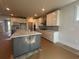 Spacious kitchen with large island, marble countertops and modern cabinetry at 1105 Oxeye St., North Myrtle Beach, SC 29582
