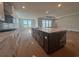 Open kitchen features a large island with seating and sleek appliances at 1105 Oxeye St., North Myrtle Beach, SC 29582