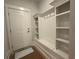Bright mudroom with built-in storage cubbies, bench and coat hooks, located near the entry door at 1105 Oxeye St., North Myrtle Beach, SC 29582