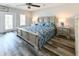 Serene main bedroom with a king-size bed and a private outdoor access at 113-B 10Th Ave. S, Surfside Beach, SC 29575