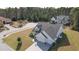 Aerial view showcasing the home's inviting curb appeal and beautifully landscaped surroundings at 1201 Ficus Dr., Myrtle Beach, SC 29579