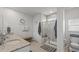 Bright bathroom boasts double sinks, granite countertops, and glass enclosed shower at 1201 Ficus Dr., Myrtle Beach, SC 29579