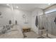 Bright bathroom boasts double sinks, granite countertops, and glass enclosed shower at 1201 Ficus Dr., Myrtle Beach, SC 29579