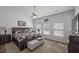 Bedroom featuring a ceiling fan, hardwood floors, and ample natural light at 1201 Ficus Dr., Myrtle Beach, SC 29579