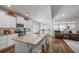 Bright kitchen with granite countertops, stainless steel appliances, and breakfast bar island with seating at 1201 Ficus Dr., Myrtle Beach, SC 29579