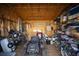 Inside the storage shed, find ample room for tools, equipment, and bikes with organized shelving at 1201 Ficus Dr., Myrtle Beach, SC 29579