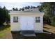 Storage shed with shutters and double doors to keep all your outdoor items secure and dry at 1201 Ficus Dr., Myrtle Beach, SC 29579