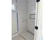 Modern shower featuring sleek, bright tiles, a niche for storage, and contemporary fixtures, ready for relaxation at 1217 Bentcreek Ln., Myrtle Beach, SC 29579