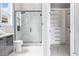 Bathroom featuring a glass enclosed shower and a white closet with shelves and drawers at 1217 Bentcreek Ln., Myrtle Beach, SC 29579